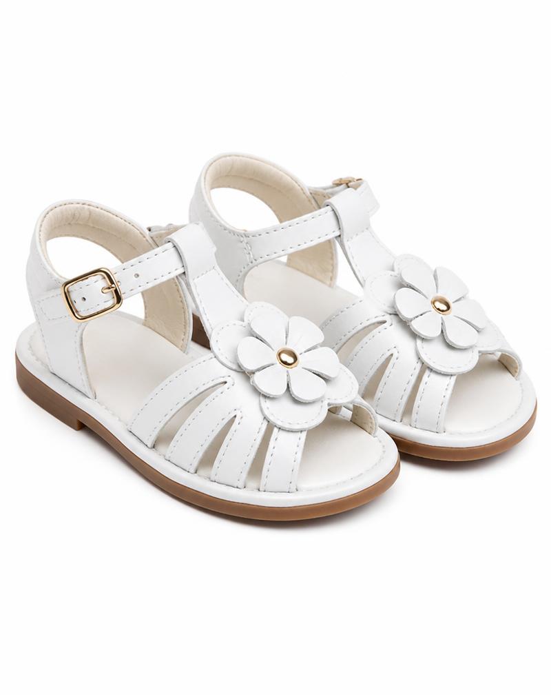 White sandals with flower detail and gold buckle